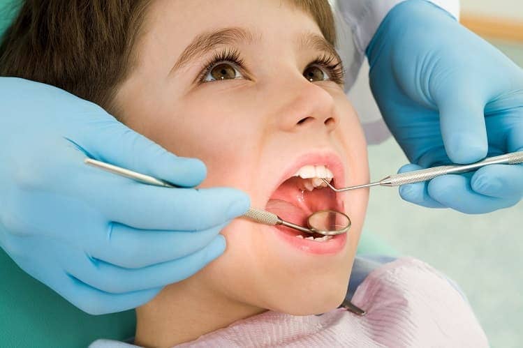 Кариес у детей - Лечение кариеса молочных зубов | Фото 1