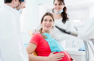 Имплантация зубов во время беременности